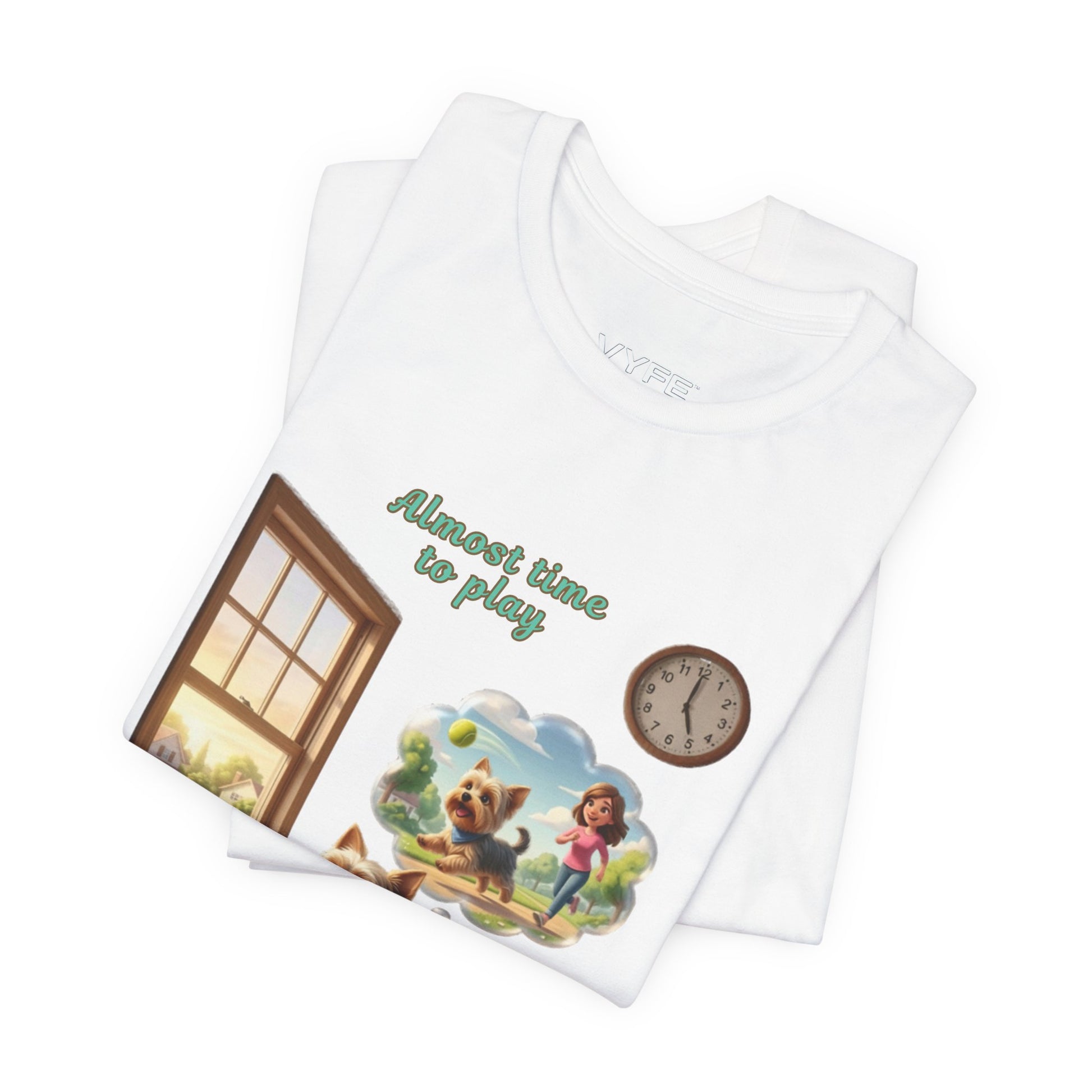 Folded white T-shirt with cartoon design featuring a dog and child, and text 'Almost time to play'.