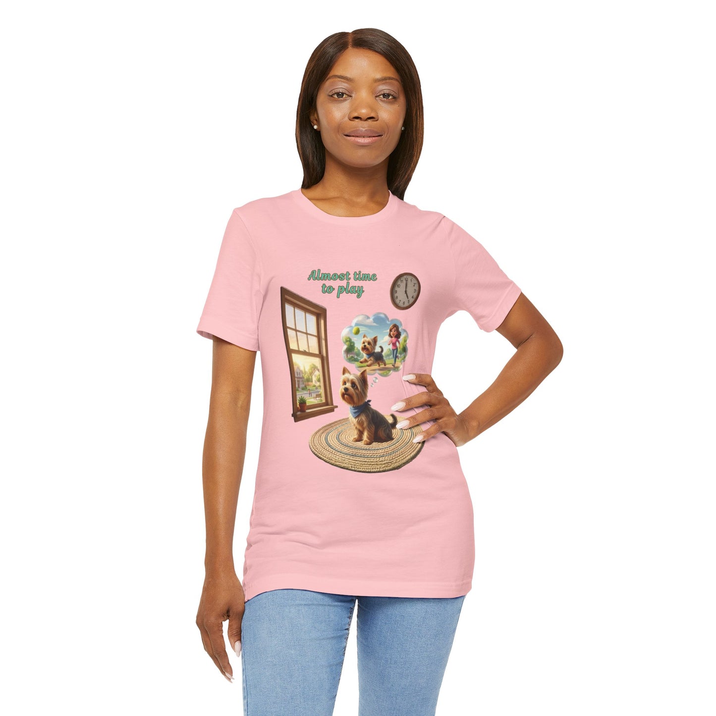 Woman wearing a pink t-shirt with a graphic design on a white background