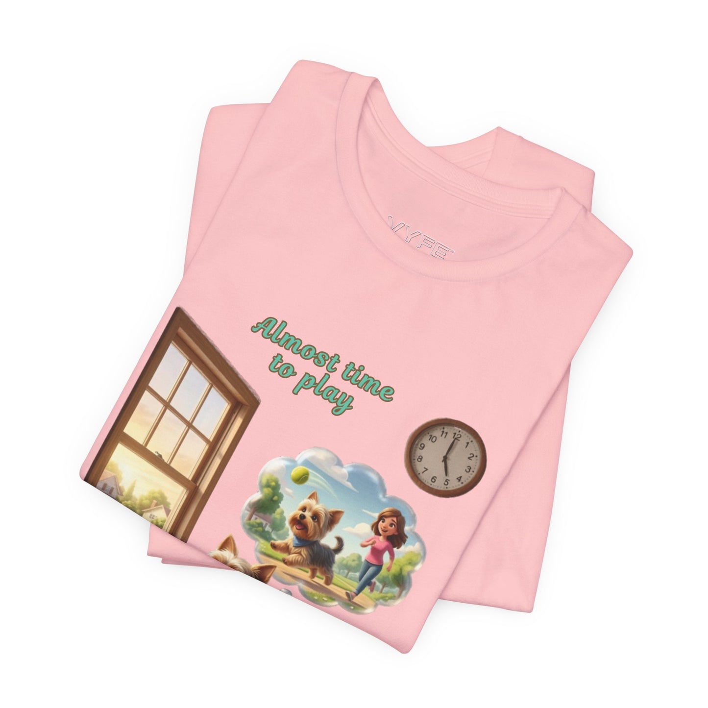 Pink t-shirt with a graphic of a girl and dog playing outside, a clock, and text 'Almost time to play'.